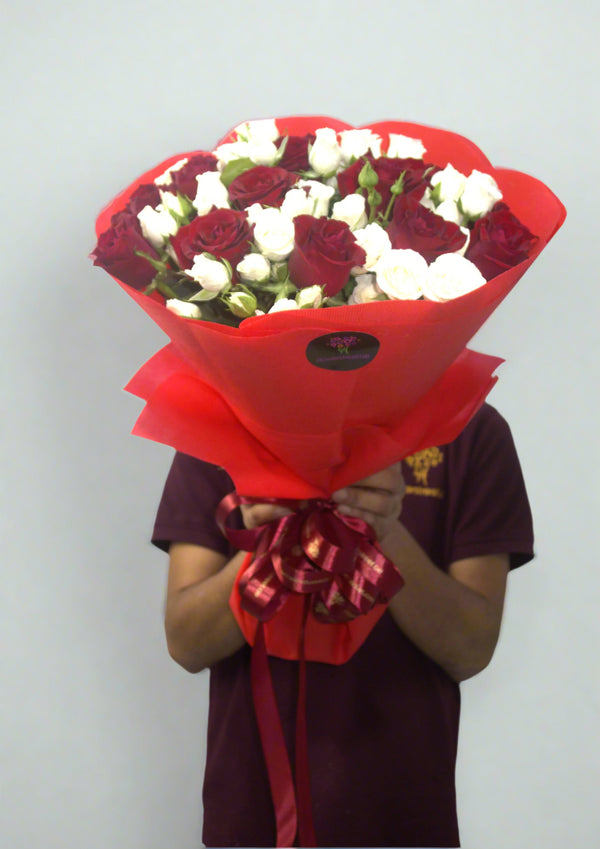 Red Roses with White Spray Roses in Red Wrapping