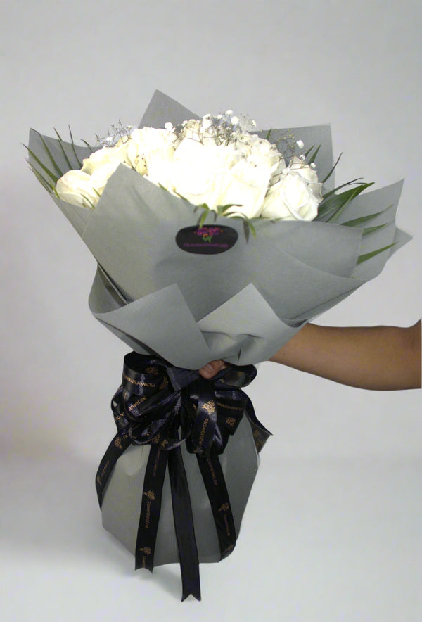 White Roses In Grey Wrapping