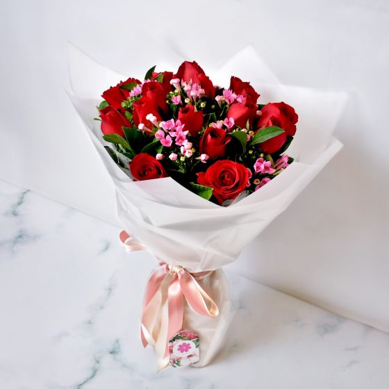 Red Rose Bouquet With Pink Wax Flowers