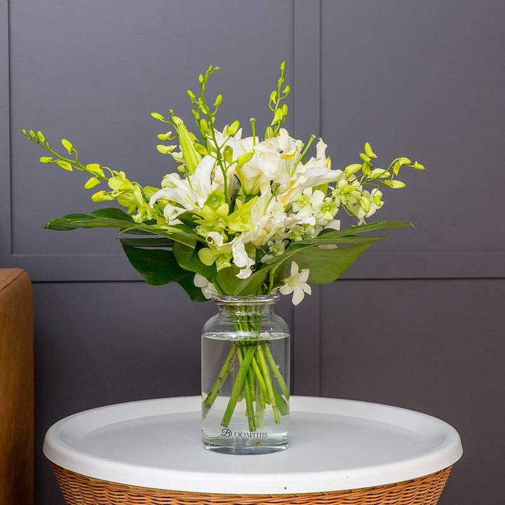 White Orchids In Vase